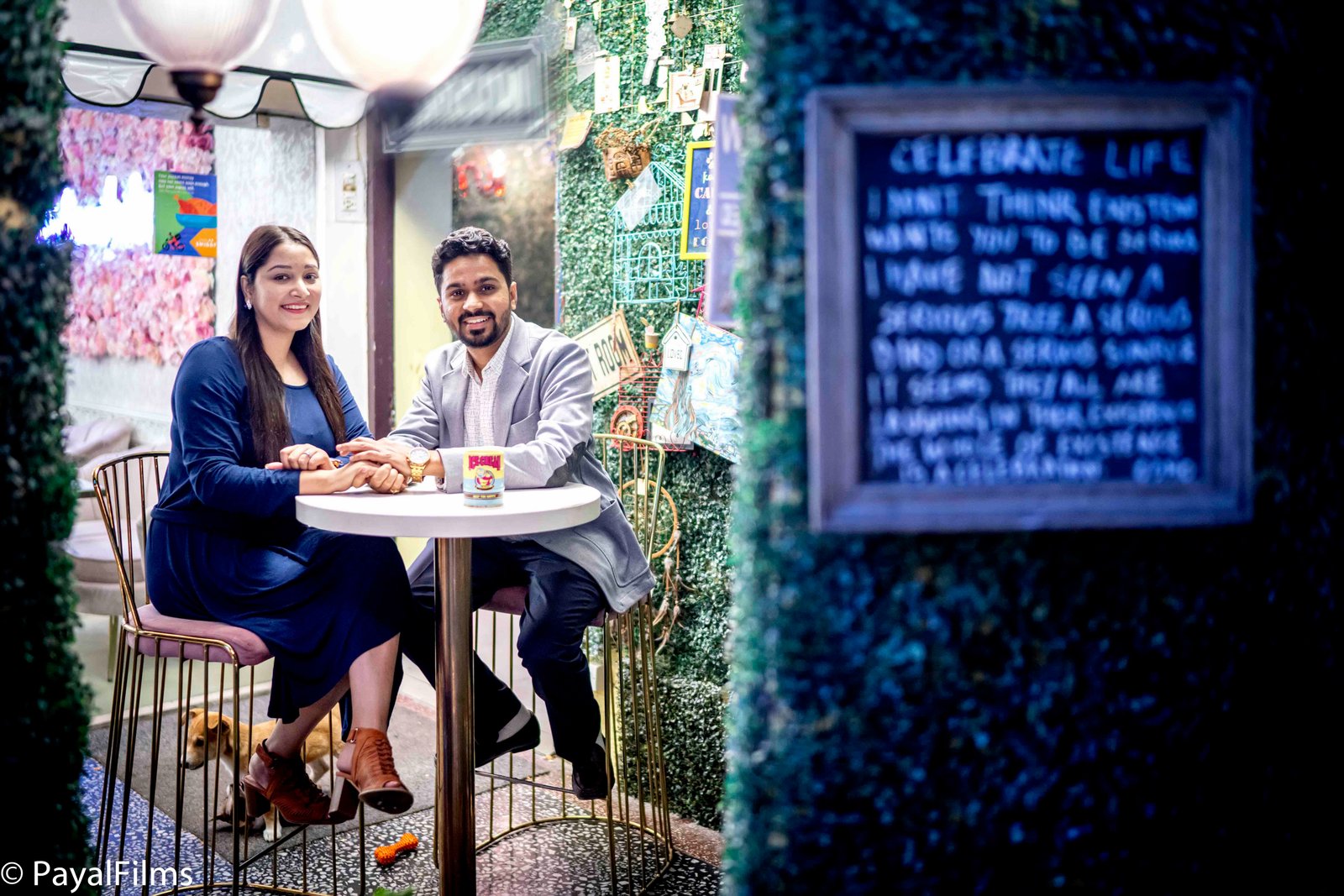 Romantic couple on a cafe date holding hands captured by Payal Films in Khagaria.
