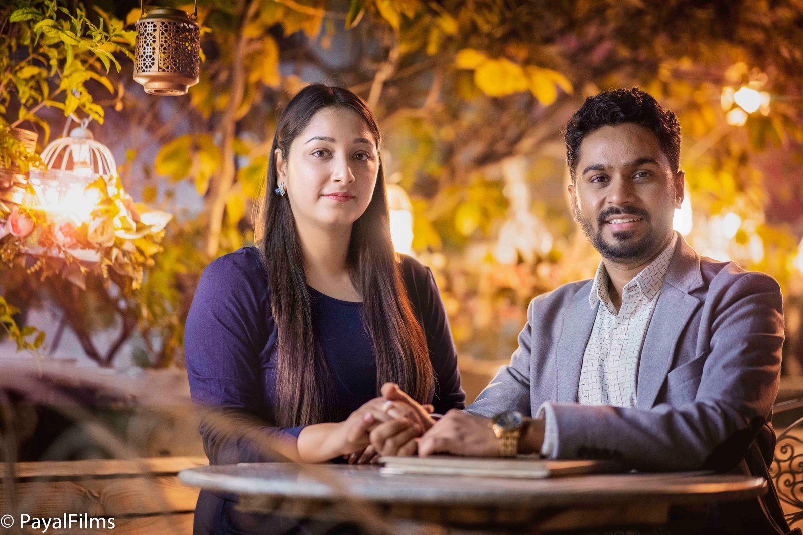 Romantic couple holding hands during an evening portrait session by Payal Films in Khagaria.