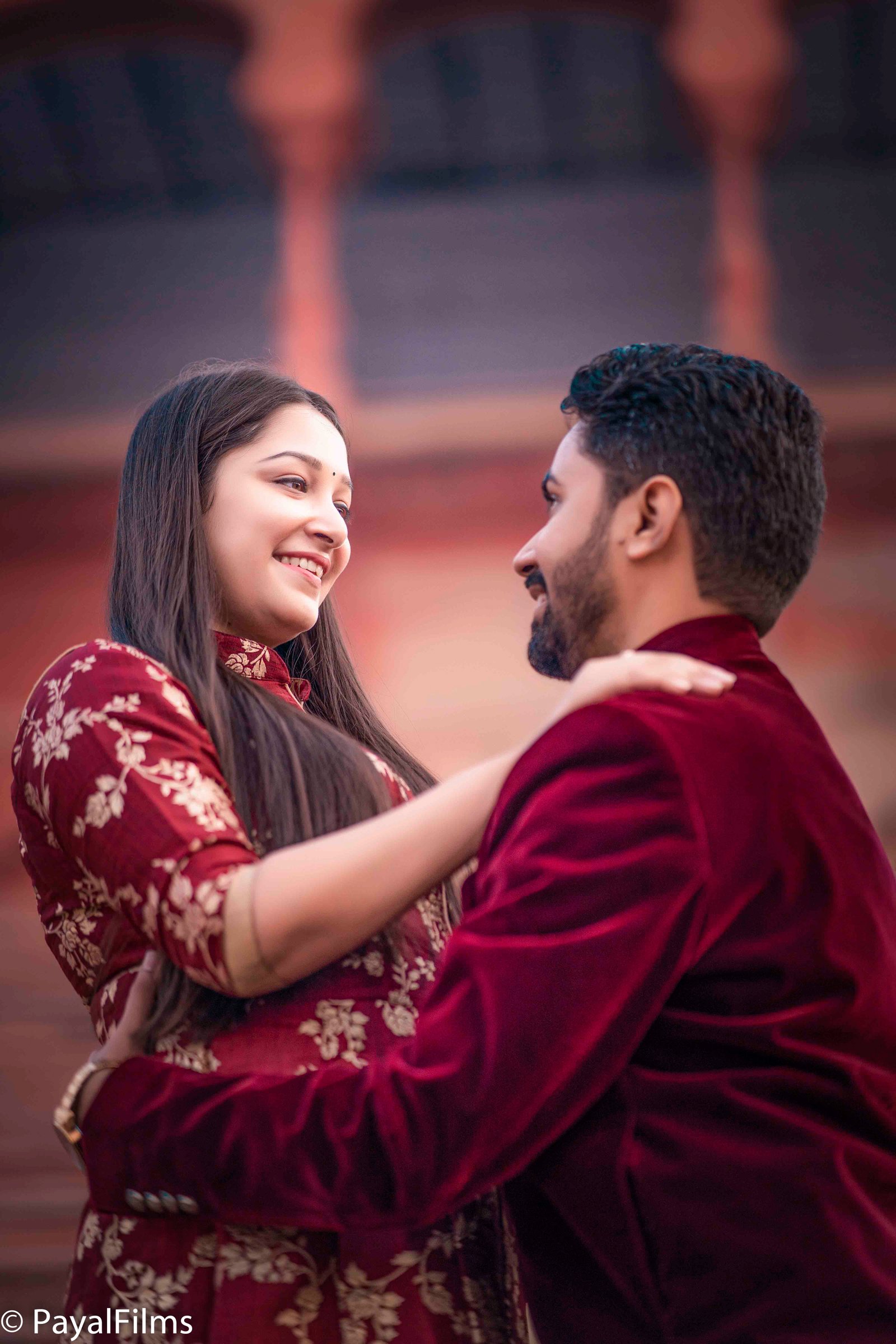 Romantic couple maroon outfits candid portrait by Payal Films Bihar