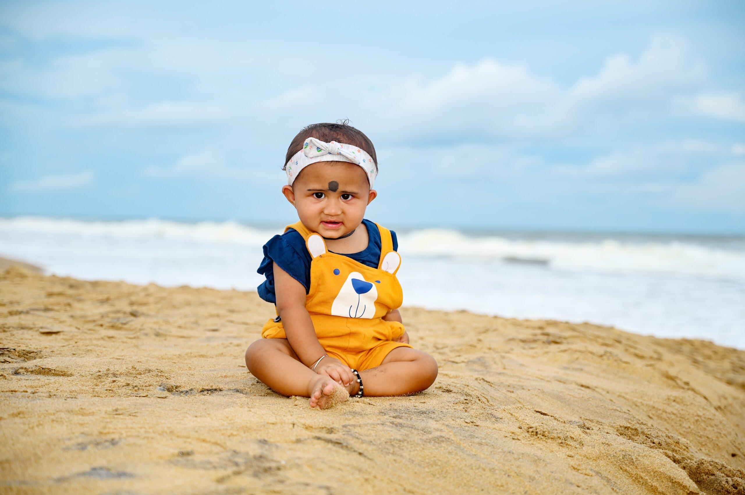 baby beach blue shirt orange overalls