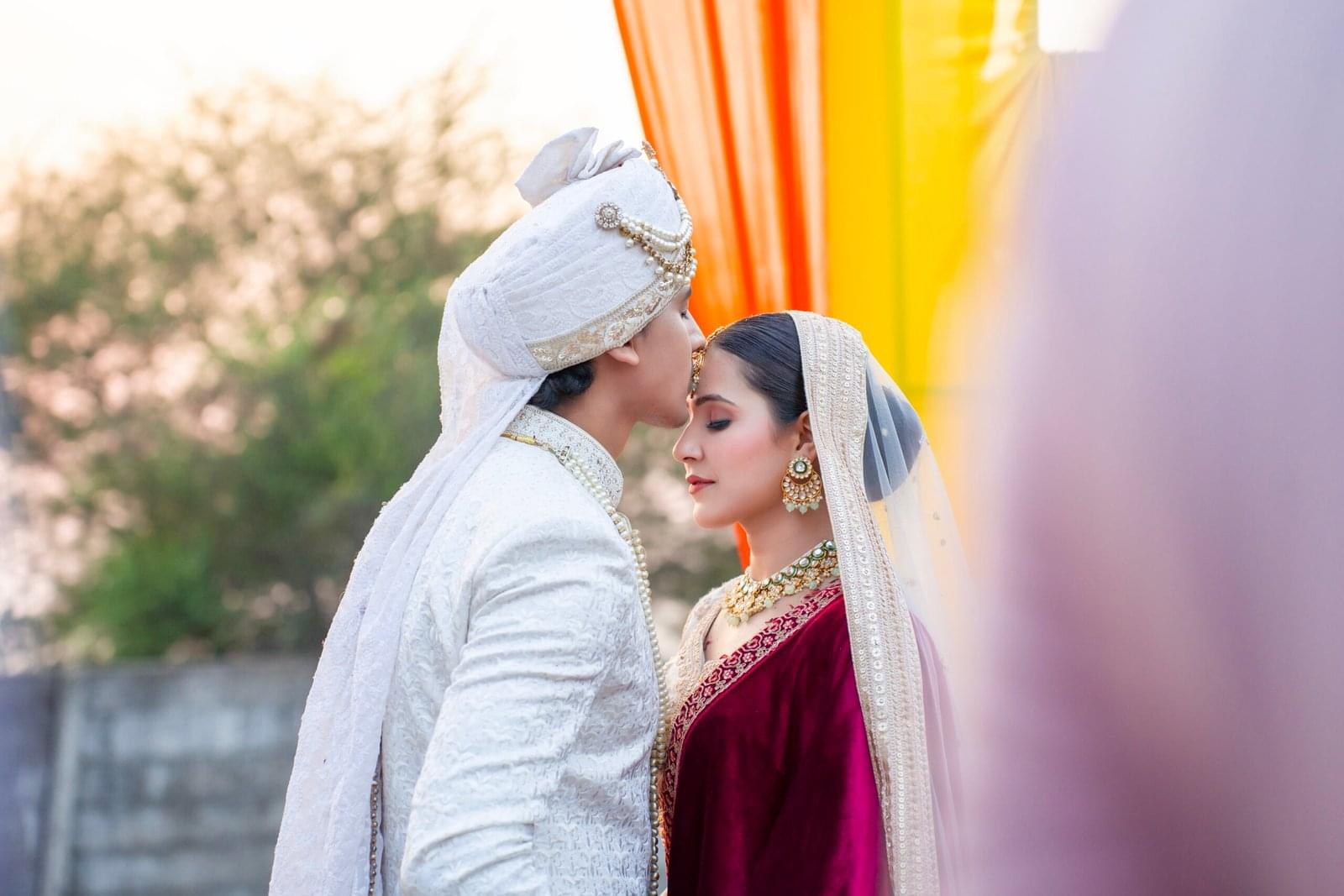 couple forehead outdoors
