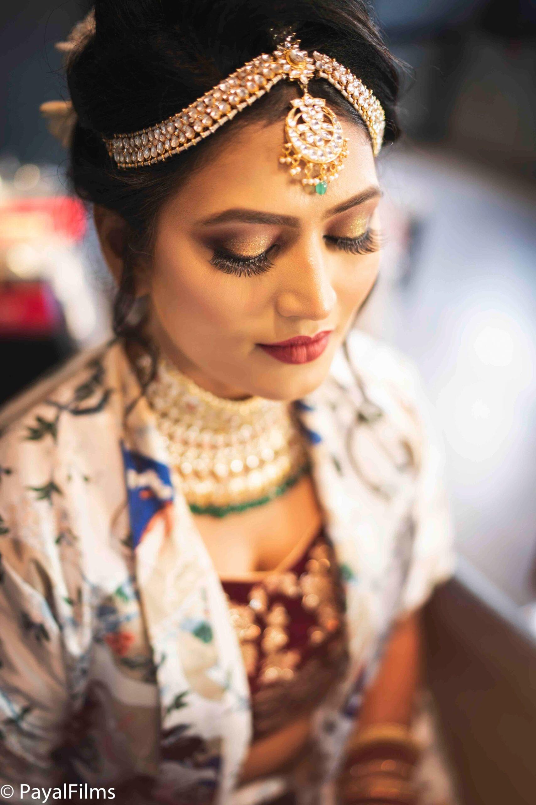 Payal Films bridal getting ready moment showcasing traditional jewelry and outfit, Bihar wedding