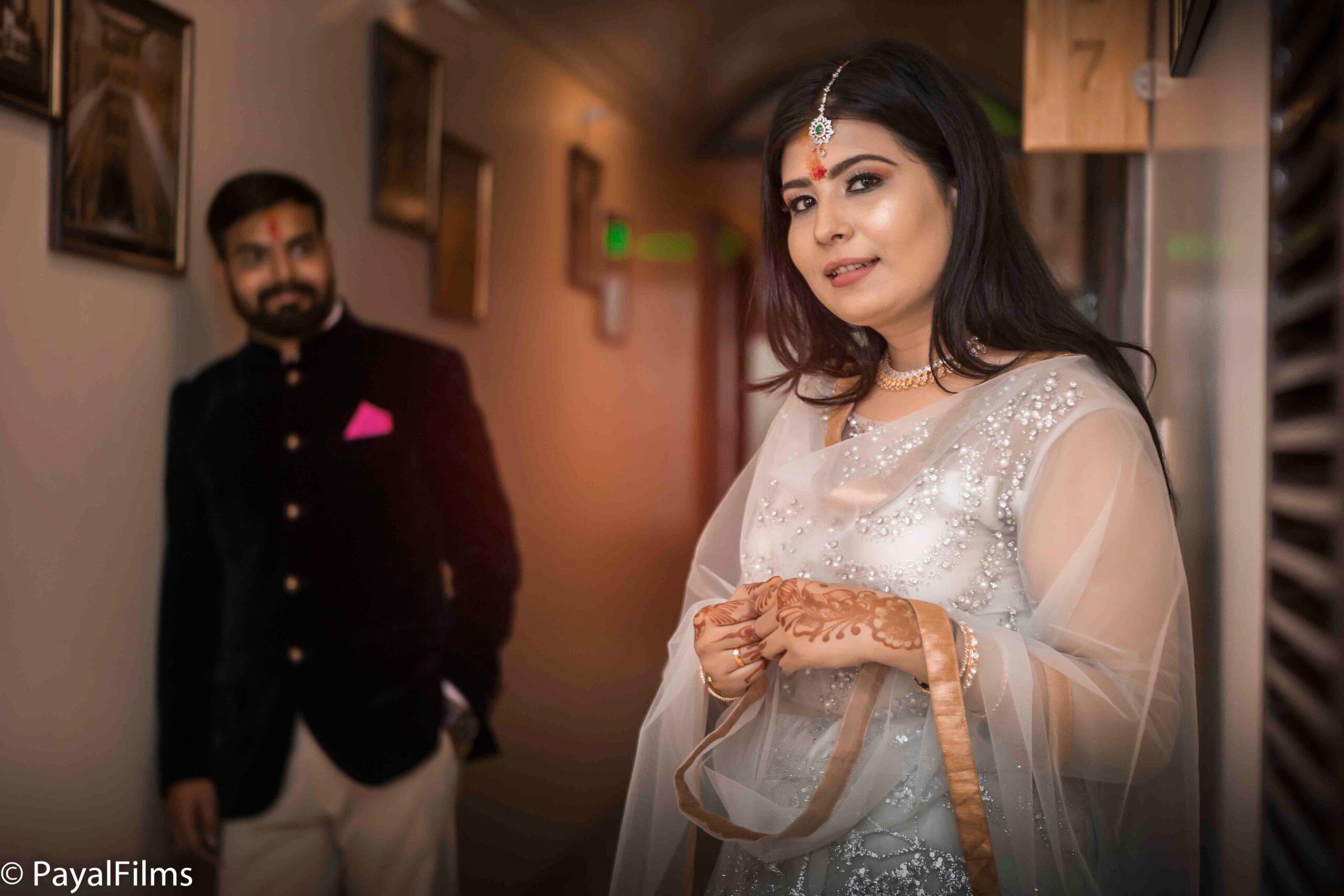 Payal Films candid engagement moment featuring a couple in elegant attire at Khagaria venue