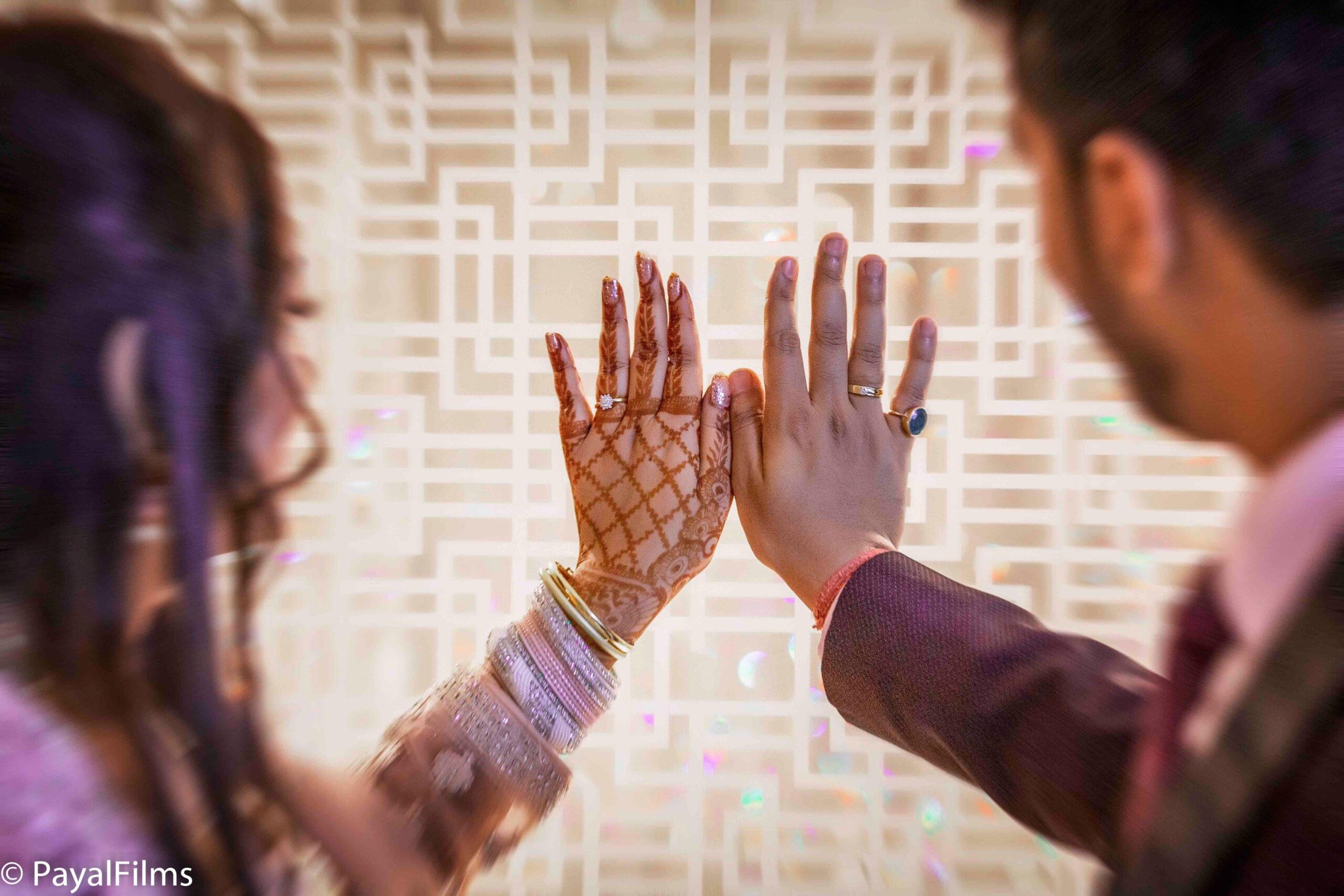 Payal Films creative ring ceremony couple hand portrait with mehendi and jewelry, Bihar wedding