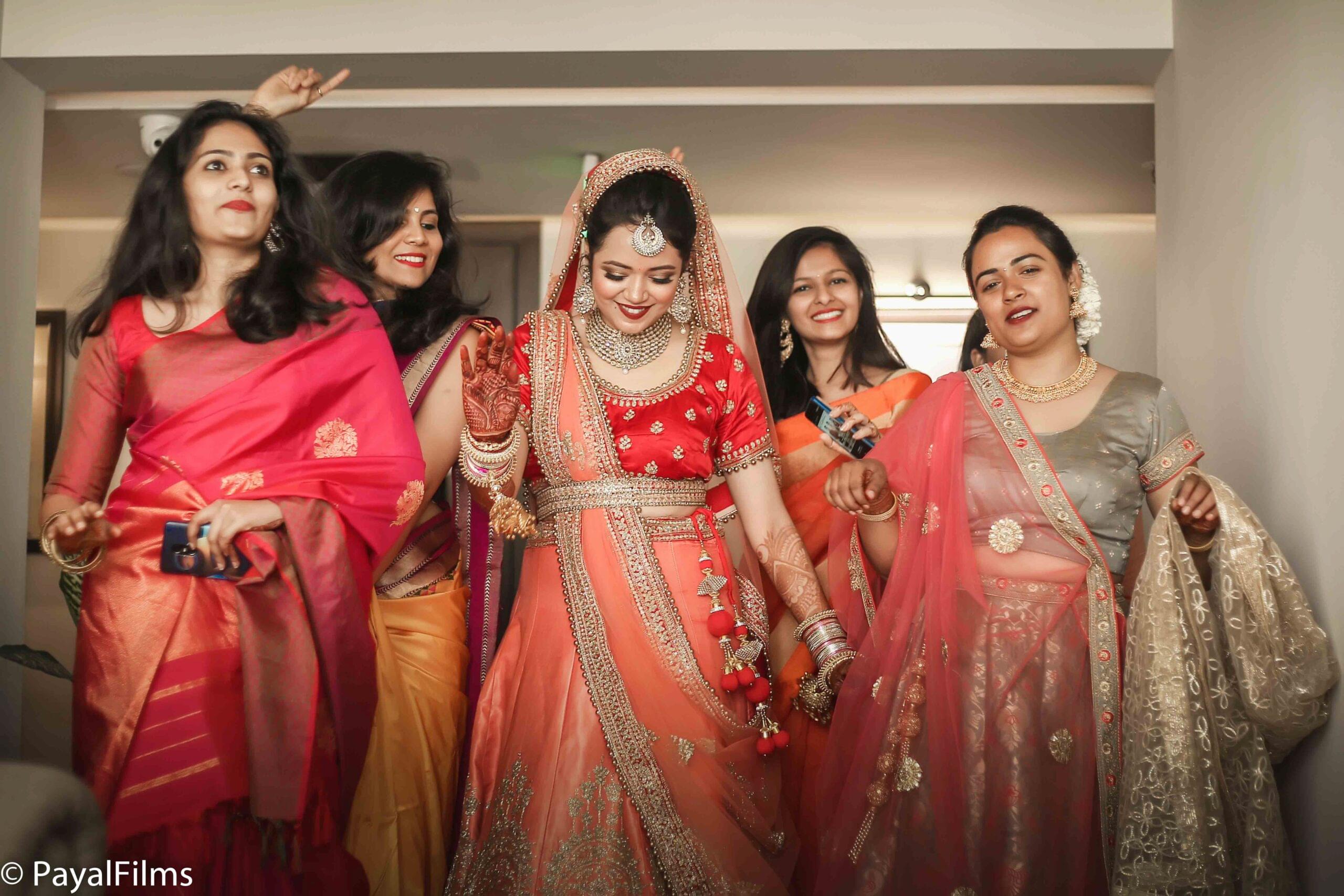 Payal Films bride making a grand entry with bridesmaids in colorful sarees at Khagaria wedding