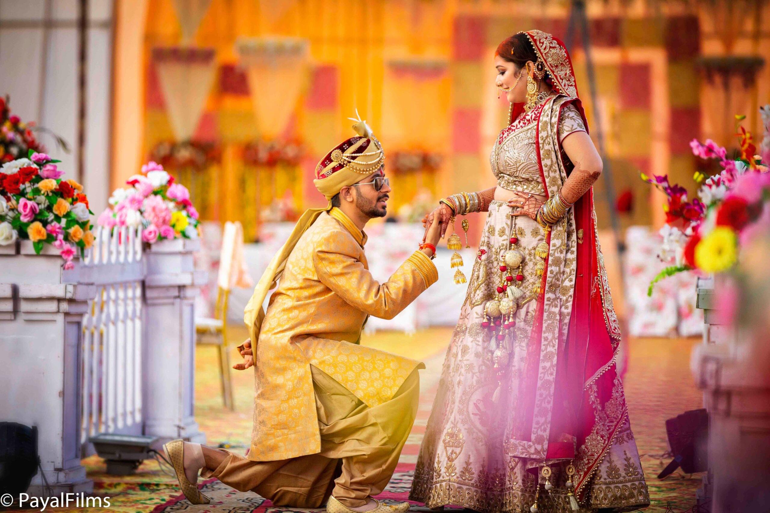 Payal Films groom proposes to bride in regal attire during outdoor Bihar